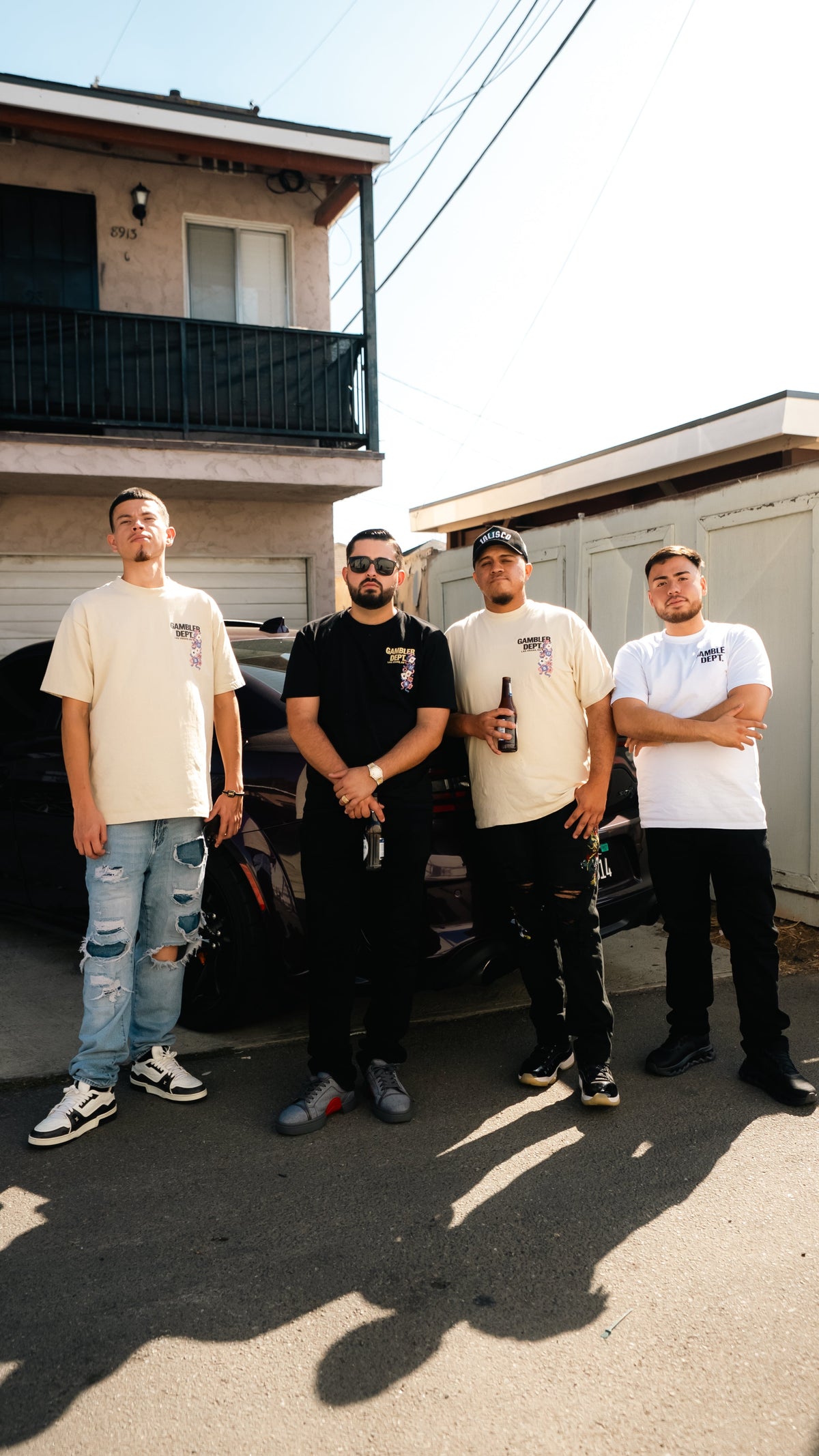 Gambler DPT Campaign 001 crew wearing Celebration and Classic tees